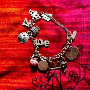 James Avery Silver Charm Bracelet with 12 charms all from Janes Avery!